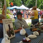 Vendors of all kinds are invited to participate in the festival. Here Chris Martin Decoys of Church Hill, Maryland displays quality handmade wooden waterfowl and shorebird decoys carved in the Eastern Shore tradition.